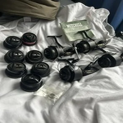 4 x Mitchell 300 reels, 1 x original box and 7 spare spools great condition.