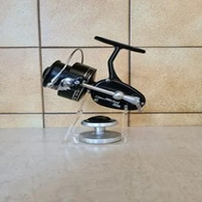 MITCHELL 300A REEL  SILVER STRIPE. MINT CONDITION. 