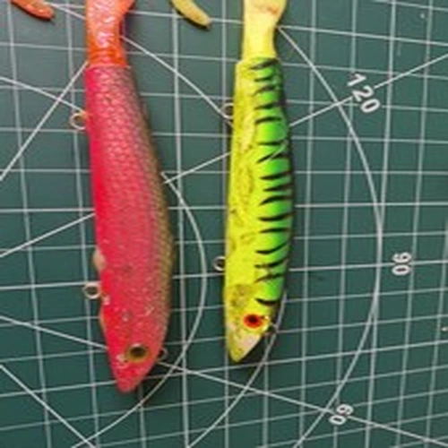 Pair of tatty Squirrely Burt Pike Fishing Lures well used and needing some love