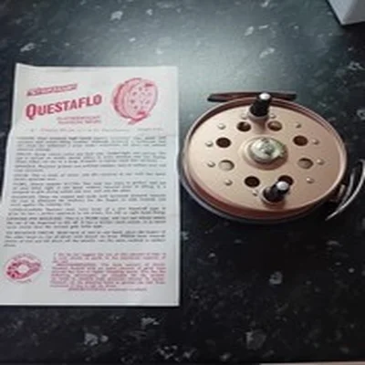 Strikeright Questaflo Centerpin Reel. With Box and Instructions.