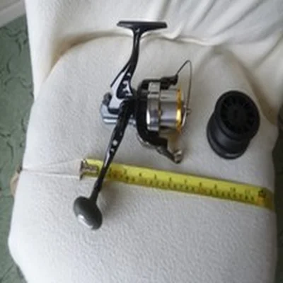 Okuma Fixe Spool fishing reel High performance.Model V11 AXZ-60 and  spare spool