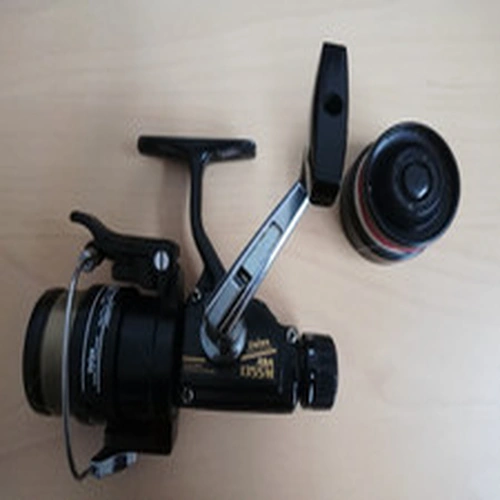 Vintage Daiwa ASA1355M fishing reel with spool, plus spare spool
