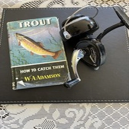 K.P. Morritt's Intrepid "Elite" reel and useful vintage book