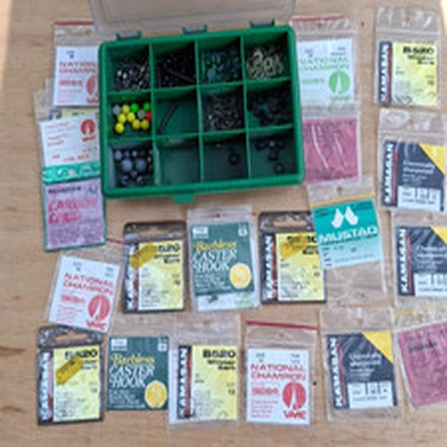 tackle box and fishing hooks