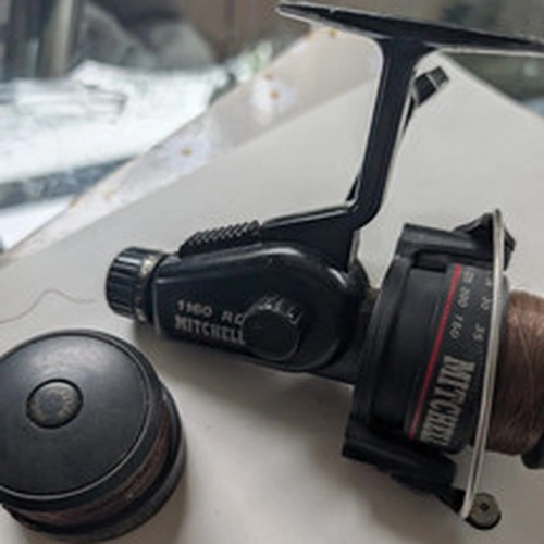 Mitchell 1160 RD Spinning Reel Black with Spare Spool