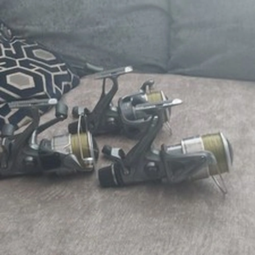 Lot of 4 Pre-Spooled Spinning Reels with Line, Front Drag, Black/Silver