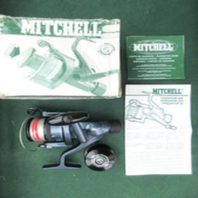MINT MITCHELL PREDATOR 60 FIXED SPOOL REEL. BOXED, SPARE SPOOL & PAPERWORK.