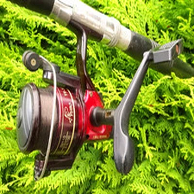 FINE USED 'YUBO' BALL BEARING FIXED SPOOL REEL. ULTRA SMOOTH ACTION.,