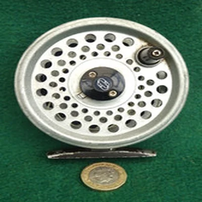 NICE INTREPID 3.5" FLY REEL LOADED WITH BACKING.  FINE WORKING ORDER, NO DAMAGE.