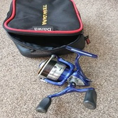 Daiwa TDR 3012D Reel with Team Daiwa Double Reel Case.