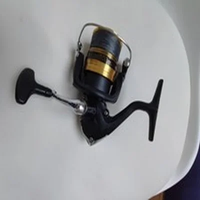 Shimano Fx 4000 Fishing Reel Spoiled With Braid, Excellent Condition