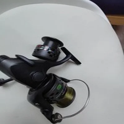 OKUMA Carbonite XP Baitfeeder CBF-140A Baitrunner Spooled With 8lb Line