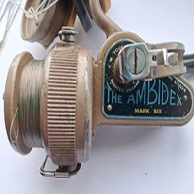 A used J W Young Ambidex Mark 6 fixed spool fishing reel angling