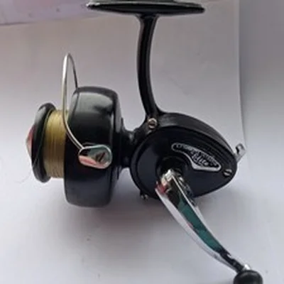 A vintage boxed Intrepid Elite fishing angling reel