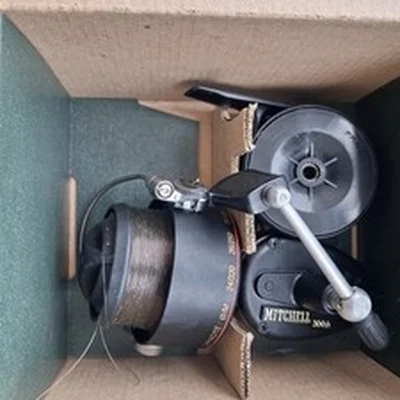 A superb vintage Boxed Mitchell 300A fishing reel .