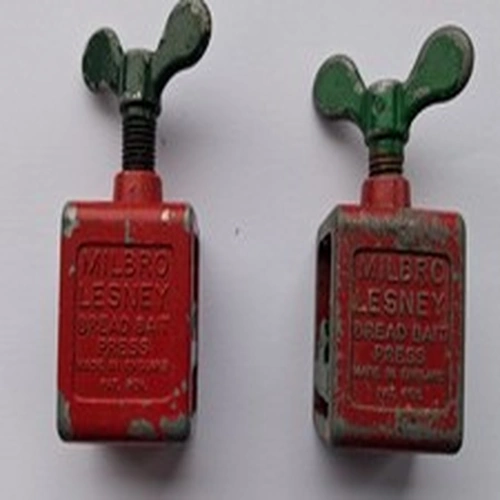 A pair of vintage Milbro Lesney Bread bait presses fishing angling