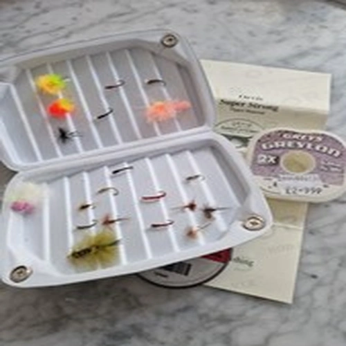 Orvis magnetic foam fly box, selection of trout flies and tippet reels