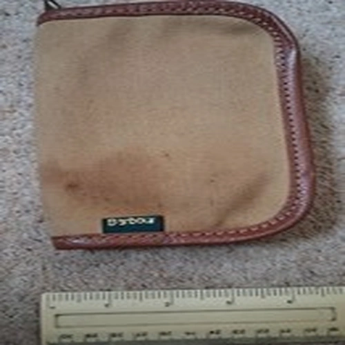 A 6 inch by 4 Barbour Fly wallet with flies