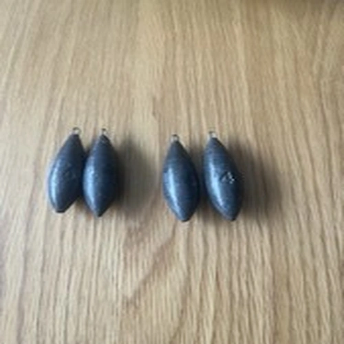 Lead 4oz Fishing Weights X 4 In Great Condition. With Hooks For Lines
