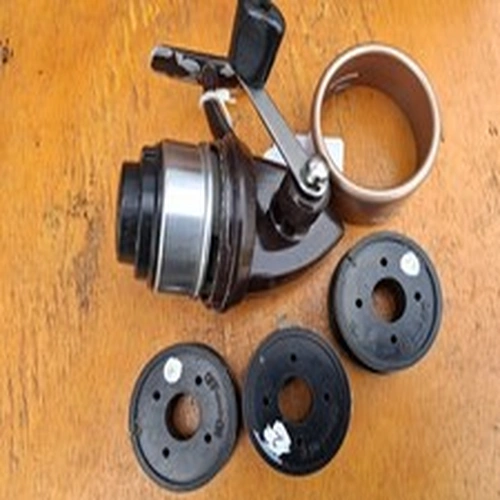 A Shakespeare Match International with four spools and case
