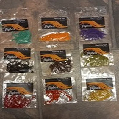 Lot 21. Fly Tying Materials.  Flybox Squirmy Legs