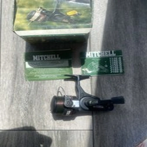 Vintage Mitchell 1160G fishing reel with box and instructions in need of clean 