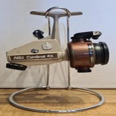 Abu Cardinal 4X fixed spool reel.  Product of  Sweden. serial number 790600