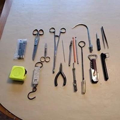 A selection of essential fishing tools and equipment