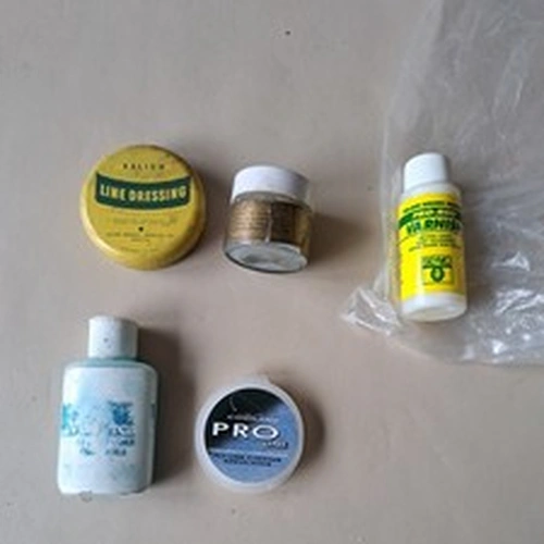 Fly fishing line cleaners, line dressing, and rod varnish, all part used