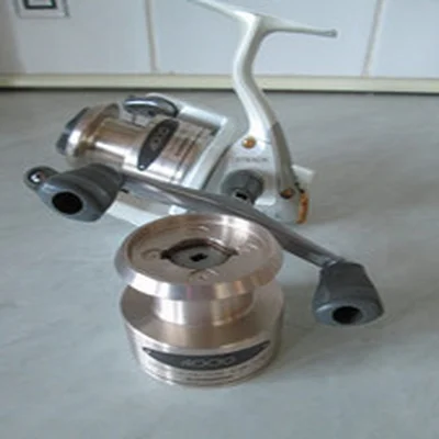SHIMANO STRADIC 4000FE FRONT DRAG REEL+  S/SPOOLS IN GREAT USED CONDITION. JAPAN