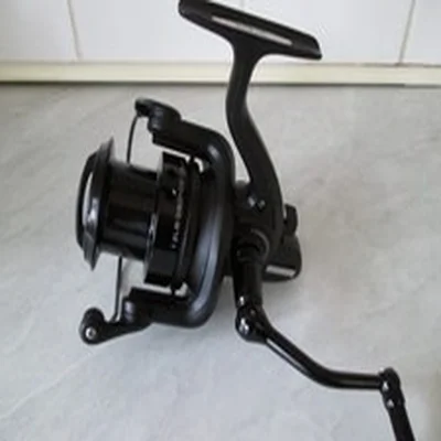 SONIK  TOURNOS 6000 FRONT DRAG REEL IN GREAT USED CONDITION.