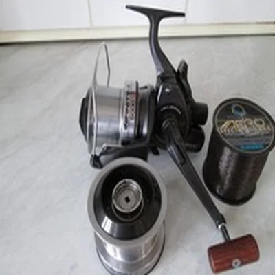 DAIWA INFINITY-X 5000BR FRONT DRAG PIT REEL + S/SPOOL IN GOOD USED CONDITION.