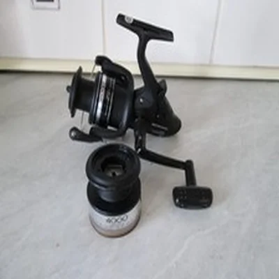 SHIMANO ST 4000FB FRONT DRAG BAITRUNNER REEL + S/SPOOL IN GREAT USED CONDITION.