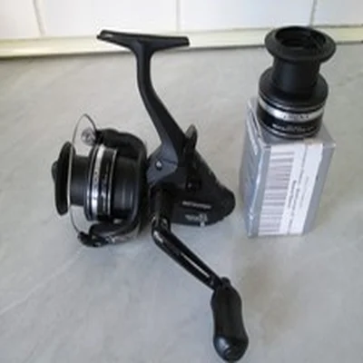 SHIMANO ST 2500FB BAITRUNNER REEL+ S/SPOOL IN GREAT USED CONDITION.