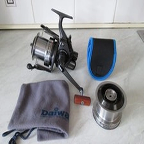 DAIWA INFINITY-X 5000BR FRONT DRAG PIT REEL + S/SPOOL IN GREAT USED CONDITION.