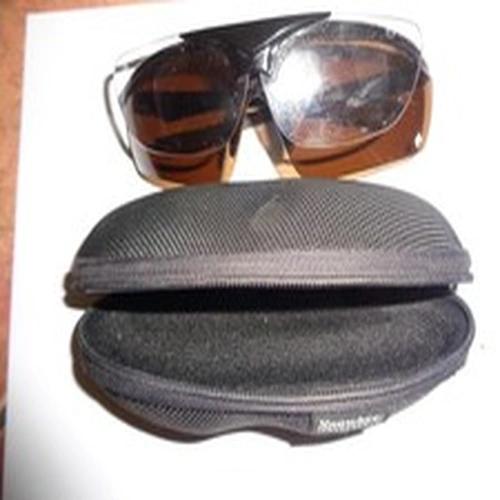 Snowbee polarized sunglasses with flip up magnifier and case.