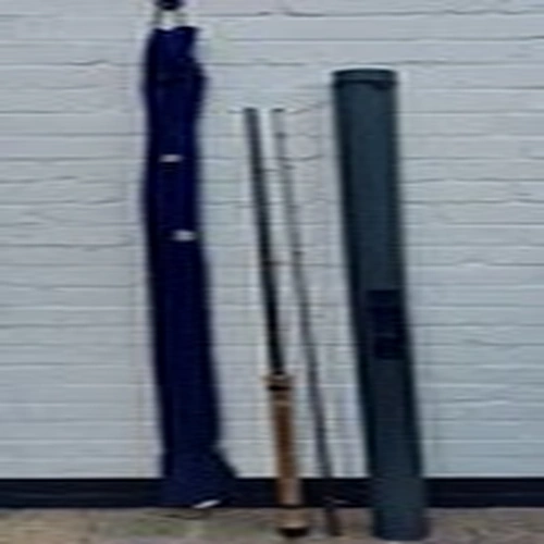 11 foot 4 inch fishing rod, cloth bag and hard carry case all in great condition