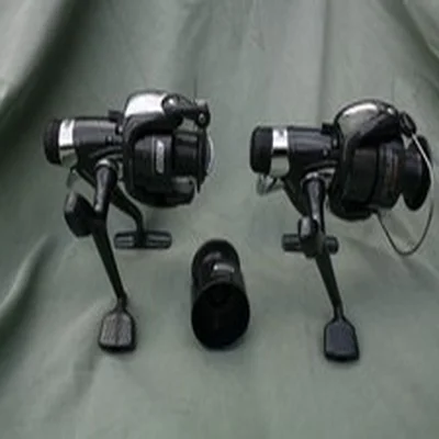 FISHING REELS AND 1 SPOOL