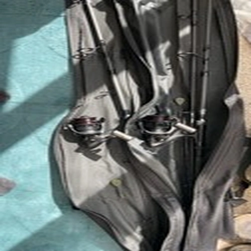 2x 10ft diawa black widow ext rods with 2x ngt reel 6000 with a rod bag