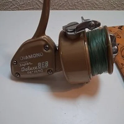 Vintage Diamond Super Delux 888 Reel, pouch and spare spool.