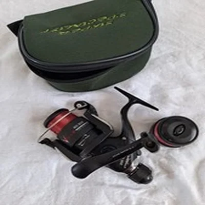 Fishing reel. Red Wolf OL-20, fresh water, with padded bag.