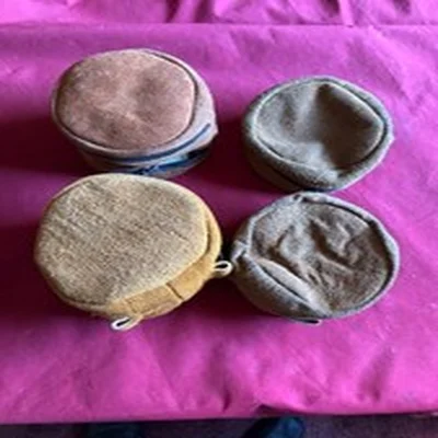 4 Suede & Sheepskin Fly Reel Cases.