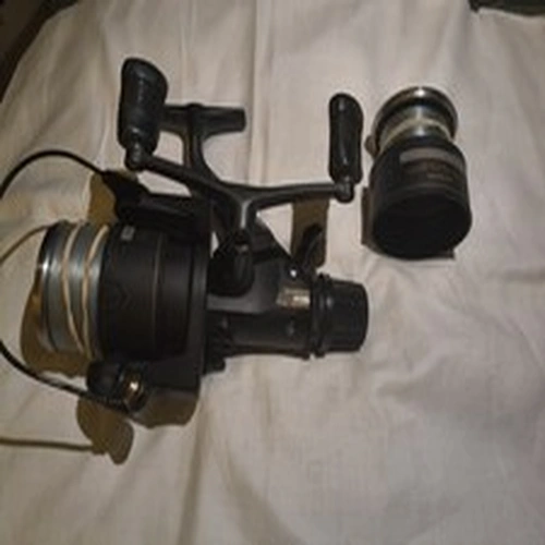 Shimano 6010 XT-7 Fishing Reel with Spare Spool  Good Condition