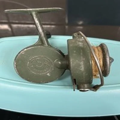 Rare Vintage 1950’s  Nettuno FSR (Fixed Spool Reel), a vintage fishing reel.