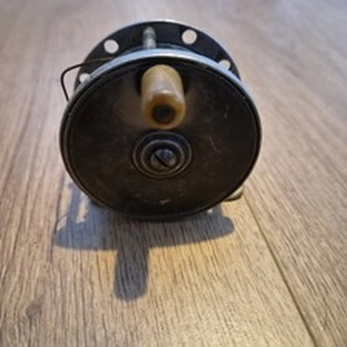 Vintage alloy fishing reel.
