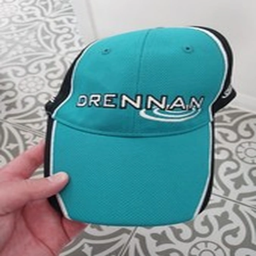 This Drennan baseball cap is an Aqua and Black model featuring an brand logo.